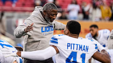 Detroit Lions defensive coordinator Aaron Glenn hugs linebacker Anthony Pittman during warmups before the game against the San Francisco 49ers at Levi's Stadium in Santa Clara, Calif. on Monday, Dec. 30, 2024.