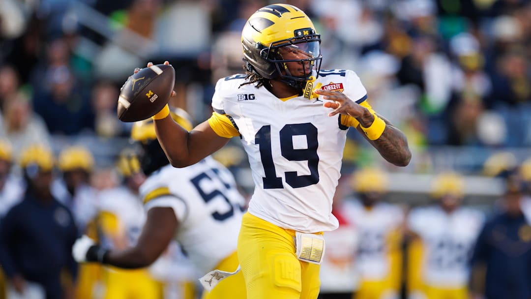 Dec 31, 2025; Orlando, FL, USA; Michigan Wolverines quarterback Bryce Underwood (19) throws the ball against the Texas Longhorns during the second half at Camping World Stadium. Mandatory Credit: Matt Pendleton-Imagn Images