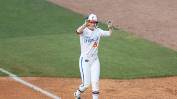 May 7, 2025; Athens, GA, USA; Florida outfielder Taylor Shumaker (21) reacts to her hit during a game against Ole Miss at Jack Turner Stadium. Mandatory Credit: Mady Mertens-Imagn Images