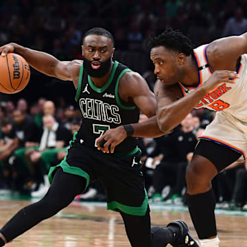 May 14, 2025; Boston, Massachusetts, USA; Boston Celtics guard Jaylen Brown (7) controls the ball from New York Knicks forward OG Anunoby (8) in the second half during game five of the second round for the 2025 NBA Playoffs at TD Garden. Mandatory Credit: Bob DeChiara-Imagn Images