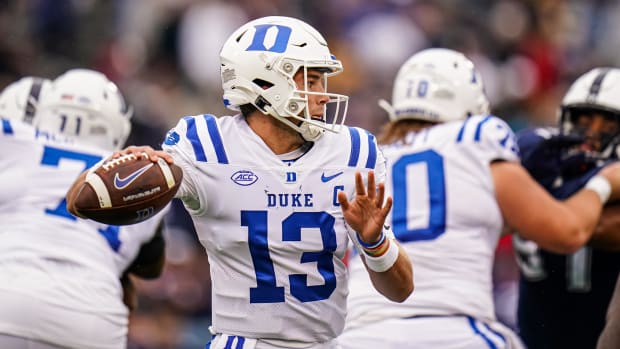 Quarterback Riley Leonard throws a pass in a 2023 game against UConn