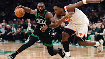 May 14, 2025; Boston, Massachusetts, USA; Boston Celtics guard Jaylen Brown (7) controls the ball from New York Knicks forward OG Anunoby (8) in the second half during game five of the second round for the 2025 NBA Playoffs at TD Garden. Mandatory Credit: Bob DeChiara-Imagn Images