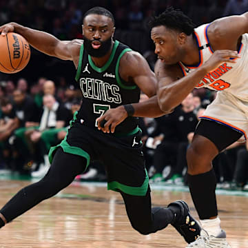 May 14, 2025; Boston, Massachusetts, USA; Boston Celtics guard Jaylen Brown (7) controls the ball from New York Knicks forward OG Anunoby (8) in the second half during game five of the second round for the 2025 NBA Playoffs at TD Garden. Mandatory Credit: Bob DeChiara-Imagn Images