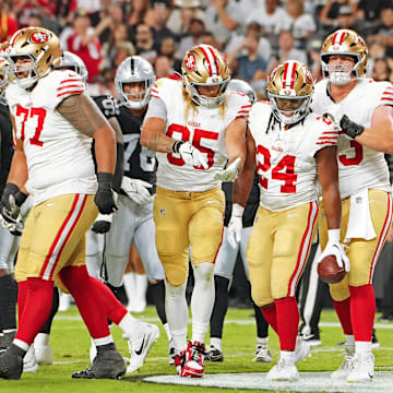 Aug 23, 2024; Paradise, Nevada, USA; San Francisco 49ers running back Jordan Mason (24) celebrates with team mates after scoring a touchdown against the Las Vegas Raiders during the first quarter at Allegiant Stadium. Mandatory Credit: Stephen R. Sylvanie-Imagn Images