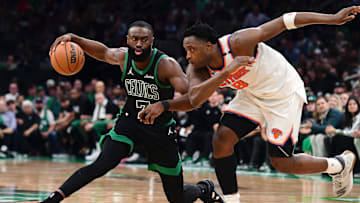 Boston Celtics guard Jaylen Brown controls the ball from New York Knicks star OG Anunoby during the 2025 NBA Playoffs
