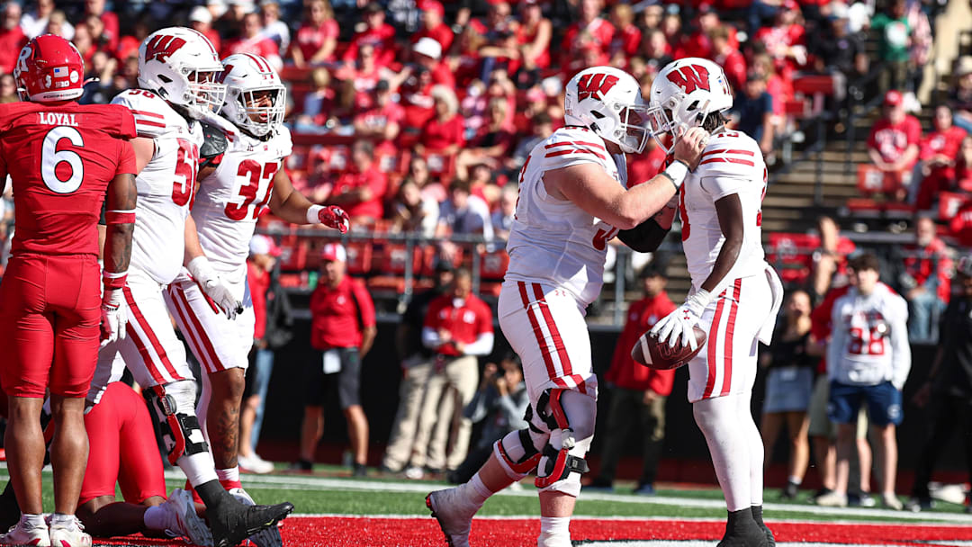 Wisconsin running back Darrion Dupree celebrates his touchdown run with offensive lineman Jake Renfro during the second half against Rutgers at SHI Stadium in Piscataway, N.J., on Oct, 12, 2024.