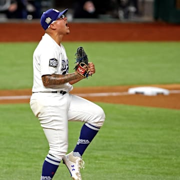 iOct 27, 2020; Arlington, Texas, USA;  Los Angeles Dodgers starting pitcher Julio Urias (7) celebrates after the Los Angeles Dodgers beat the Tampa Bay Rays to win the World Series in during game six of the 2020 World Series at Globe Life Field. Mandatory Credit: Tim Heitman-Imagn Images
