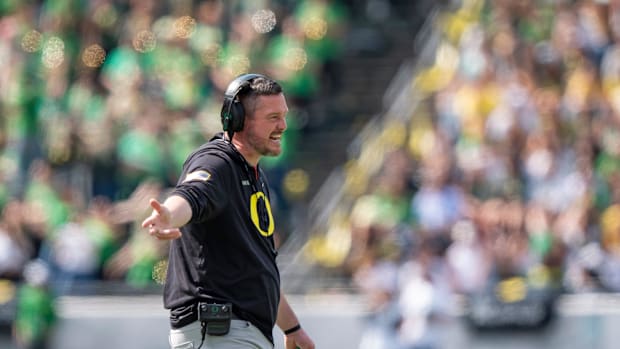 Oregon head coach Dan Lanning yells to the officials as the Fighting Ducks face off against Mighty Oregon