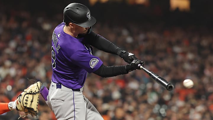 Sep 26, 2025; San Francisco, California, USA; Colorado Rockies center fielder Brenton Doyle (9) hits a single against the San Francisco Giants during the fifth inning at Oracle Park. 