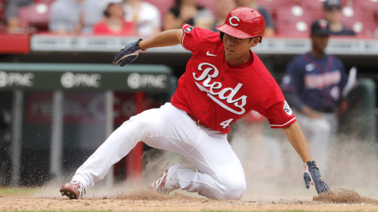 Cincinnati Reds centerfielder Shogo Akiyama (4) scores.