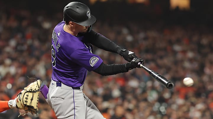 Sep 26, 2025; San Francisco, California, USA; Colorado Rockies center fielder Brenton Doyle (9) hits a single against the San Francisco Giants during the fifth inning at Oracle Park. 