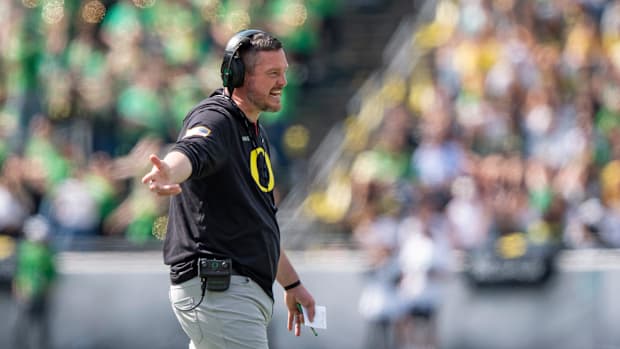 Oregon head coach Dan Lanning yells to the officials as the Fighting Ducks face off against Mighty Oregon in the Oregon Ducks