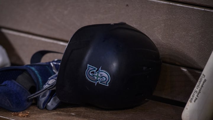 A view of a Seattle Mariners batting helmet and logo during the game between the Texas Rangers and the Seattle Mariners at Globe Life Field in 2022.