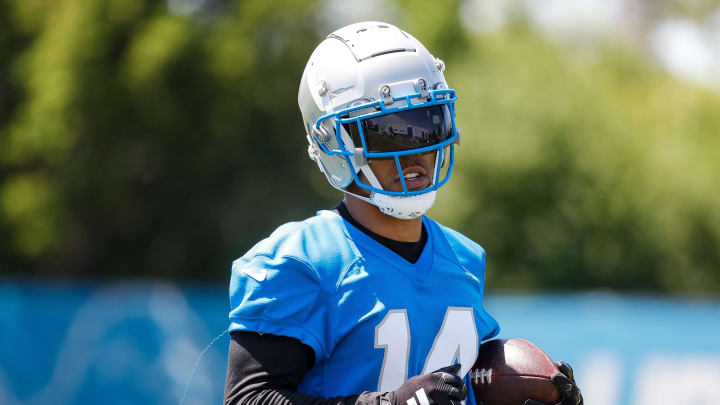 Detroit Lions wide receiver Amon-Ra St. Brown (14) during practice during OTAs at Detroit Lions headquarters and training facility in Allen Park.