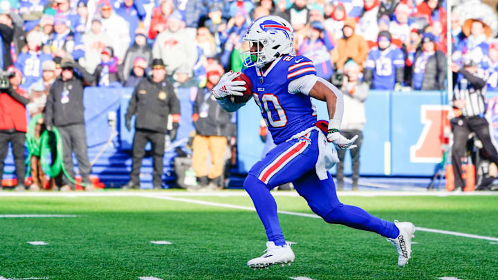 Nyheim Hines runs the ball during a playoff game against the Dolphins. Nyheim Hines runs the ball during a playoff game against the Dolphins.