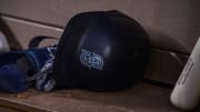 A view of a Seattle Mariners batting helmet and logo during the game between the Texas Rangers and the Seattle Mariners in June 2022.