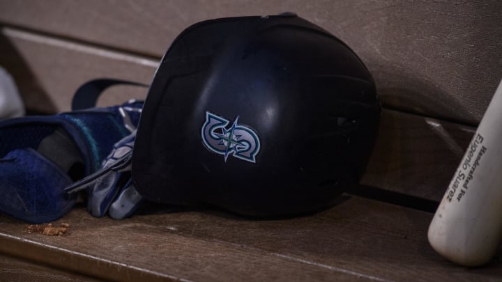 A view of a Seattle Mariners batting helmet and logo during the game between the Texas Rangers and the Mariners in 2022 at Globe Life Field.