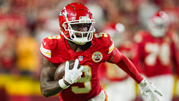 Oct 7, 2024; Kansas City, Missouri, USA; Kansas City Chiefs wide receiver JuJu Smith-Schuster (9) runs with the ball during the first half against the New Orleans Saints at GEHA Field at Arrowhead Stadium.