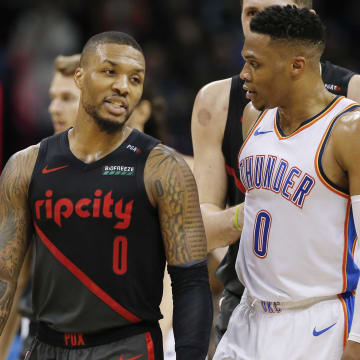 Jan 22, 2019; Oklahoma City, OK, USA; Portland Trail Blazers guard Damian Lillard, left, and Oklahoma City Thunder guard Russell Westbrook, right, have a conversation following the end a game at Chesapeake Energy Arena. Oklahoma City won 123-114. Mandatory Credit: Alonzo Adams-USA TODAY Sports