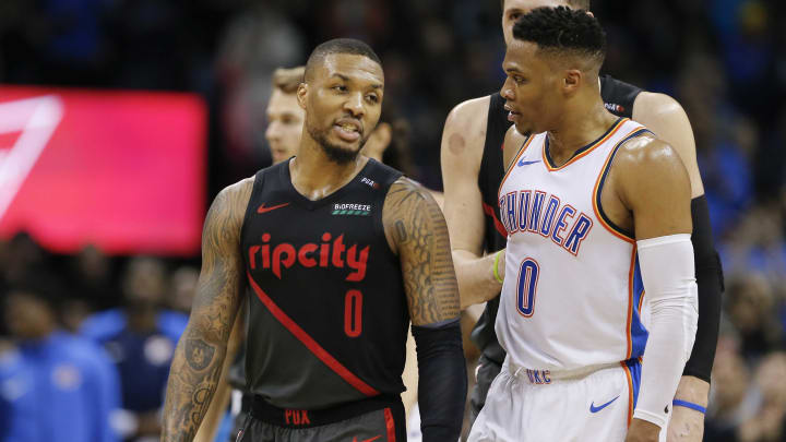 Jan 22, 2019; Oklahoma City, OK, USA; Portland Trail Blazers guard Damian Lillard, left, and Oklahoma City Thunder guard Russell Westbrook, right, have a conversation following the end a game at Chesapeake Energy Arena. Oklahoma City won 123-114. Mandatory Credit: Alonzo Adams-USA TODAY Sports