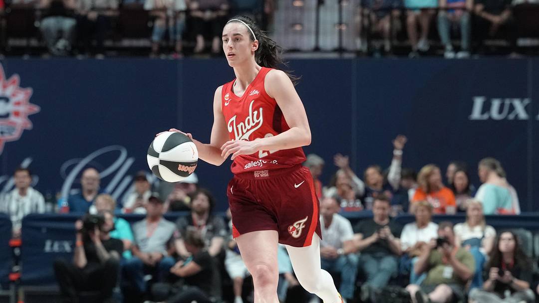 Jun 13, 2026; Uncasville, Connecticut, USA; Indiana Fever guard Caitlin Clark (22) dribbles the ball up the court against the Connecticut Sun during the second half at Mohegan Sun Arena. Mandatory Credit: Gregory Fisher-Imagn Images