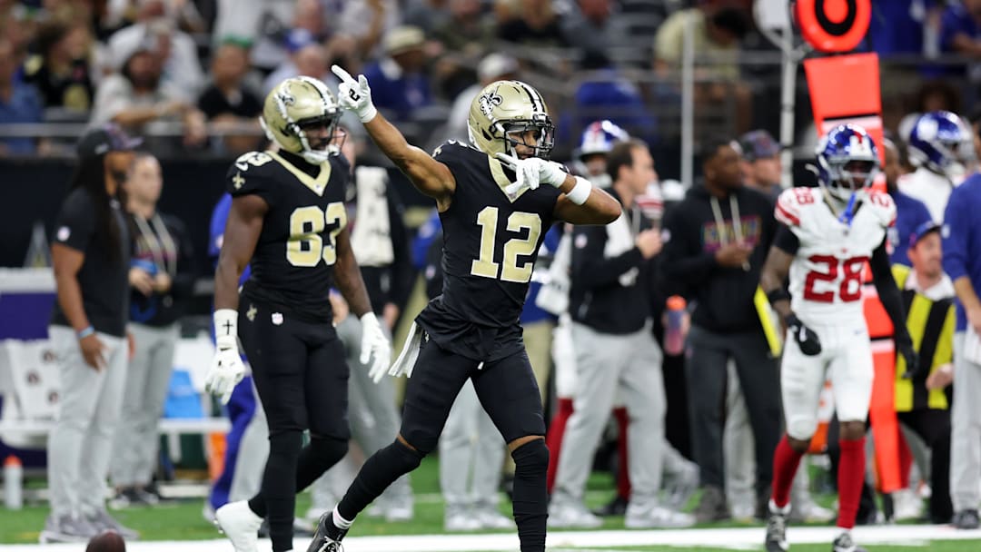 Oct 5, 2025; New Orleans, Louisiana, USA; New Orleans Saints wide receiver Chris Olave (12) reacts after a play against the New York Giants during the second half at Caesars Superdome. Mandatory Credit: Stephen Lew-Imagn Images