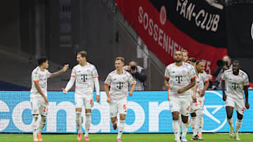 Bayern Munich players celebrating against Eintracht Frankfurt.