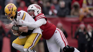 Wisconsin defensive lineman Elijah Hills (94) sacks Minnesota quarterback Max Brosmer (16) during the second quarter of their game at Camp Randall Stadium Friday, November 29, 2024 in Madison, Wisconsin.

Mark Hoffman/Milwaukee Journal Sentinel