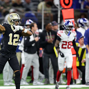 Oct 5, 2025; New Orleans, Louisiana, USA; New Orleans Saints wide receiver Chris Olave (12) reacts after a play against the New York Giants during the second half at Caesars Superdome. Mandatory Credit: Stephen Lew-Imagn Images