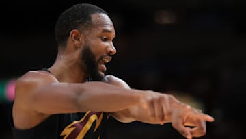 Apr 28, 2025; Miami, Florida, USA; Cleveland Cavaliers forward Evan Mobley (4) signals as he talk to a referee in the second quarter during game four for the first round of the 2025 NBA Playoffs against the Miami Heat at Kaseya Center. Mandatory Credit: Sam Navarro-Imagn Images
