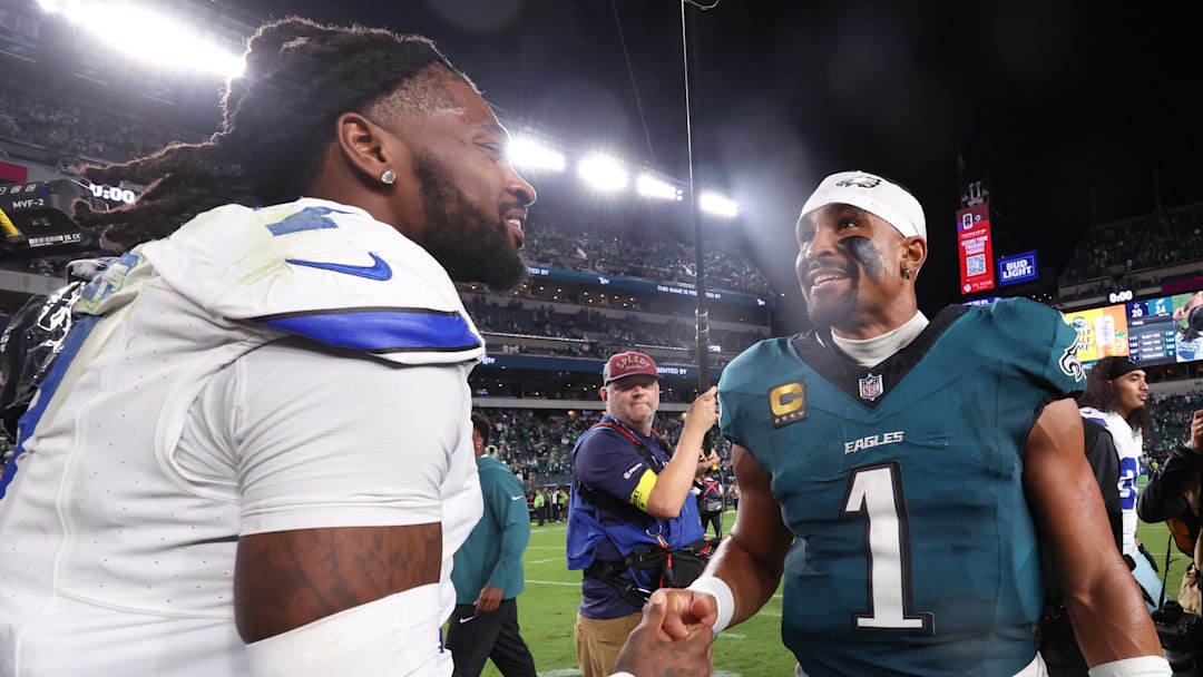 Sep 4, 2025; Philadelphia, Pennsylvania, USA; Philadelphia Eagles quarterback Jalen Hurts (1) shakes hands with Dallas Cowboys cornerback Trevon Diggs (7) after the game at Lincoln Financial Field. Mandatory Credit: Bill Streicher-Imagn Images