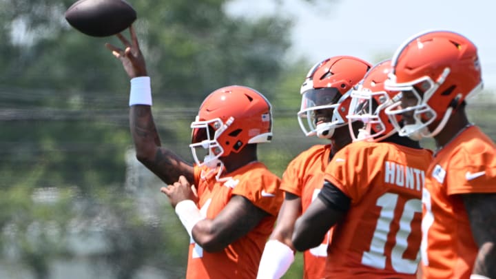 Aug 4, 2024; Cleveland Browns quarterback Deshaun Watson (4) throws a pass while the other quarterbacks look on at the Browns training facility in Berea, Ohio. Mandatory Credit: Bob Donnan-USA TODAY Sports