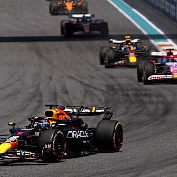 May 4, 2024; Miami Gardens, Florida, USA; Red Bull Racing driver Max Verstappen (1) lead the field into turn one during the F1 Sprint Race at Miami International Autodrome. Mandatory Credit: Peter Casey-Imagn Images