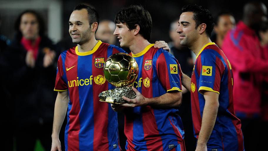 Andrés Iniesta (left), Lionel Messi (center) and Xavi Hernández.