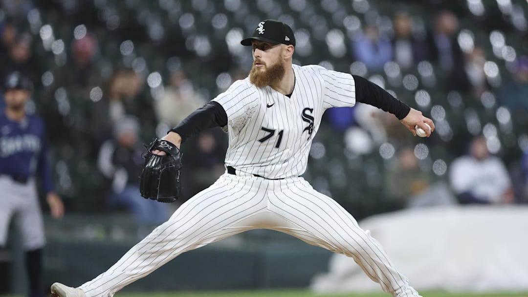May 19, 2025; Chicago, Illinois, USA; Chicago White Sox relief pitcher Cam Booser (71) delivers a pitch against the Seattle Mariners during the eight inning at Rate Field. Mandatory Credit: Kamil Krzaczynski-Imagn Images