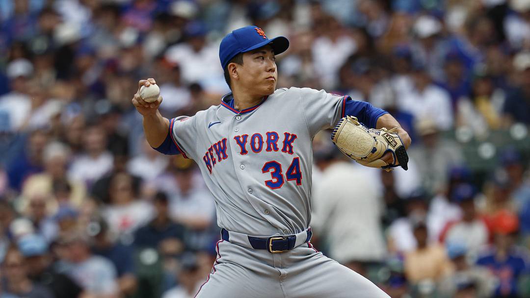 Apr 17, 2026; Chicago, Illinois, USA; New York Mets starting pitcher Kodai Senga (34) delivers a pitch against the Chicago Cubs during the first inning at Wrigley Field. Mandatory Credit: Kamil Krzaczynski-Imagn Images