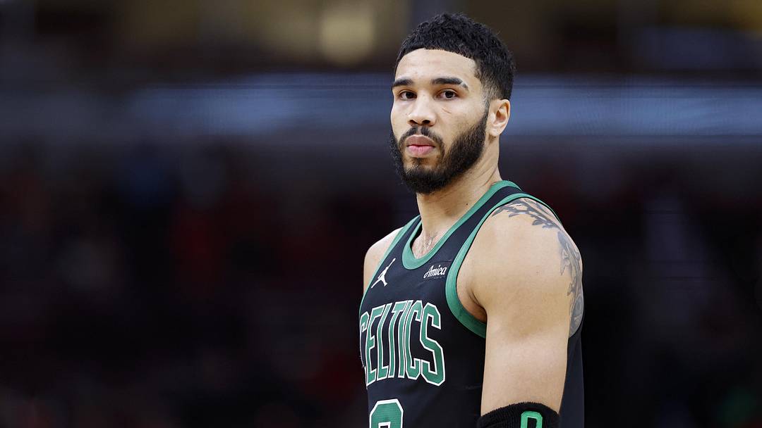 Dec 21, 2024; Chicago, Illinois, USA; Boston Celtics forward Jayson Tatum (0) looks on during the first half against the Chicago Bulls at United Center. 