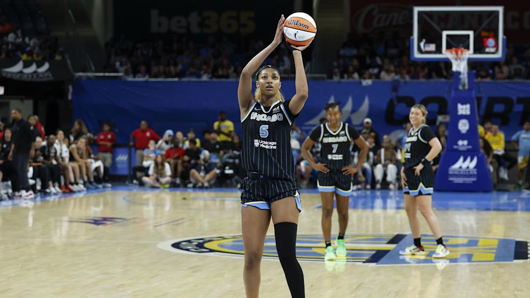 Jul 9, 2025; Chicago, Illinois, USA; Chicago Sky forward Angel Reese (5) shoots a free throw against the Dallas Wings during the second half of a WNBA game at Wintrust Arena. 