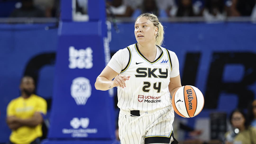 Jul 24, 2025; Chicago, Illinois, USA; Chicago Sky guard Rachel Banham (24) brings the ball up court against the Seattle Storm during the first half at Wintrust Arena. Mandatory Credit: Kamil Krzaczynski-Imagn Images