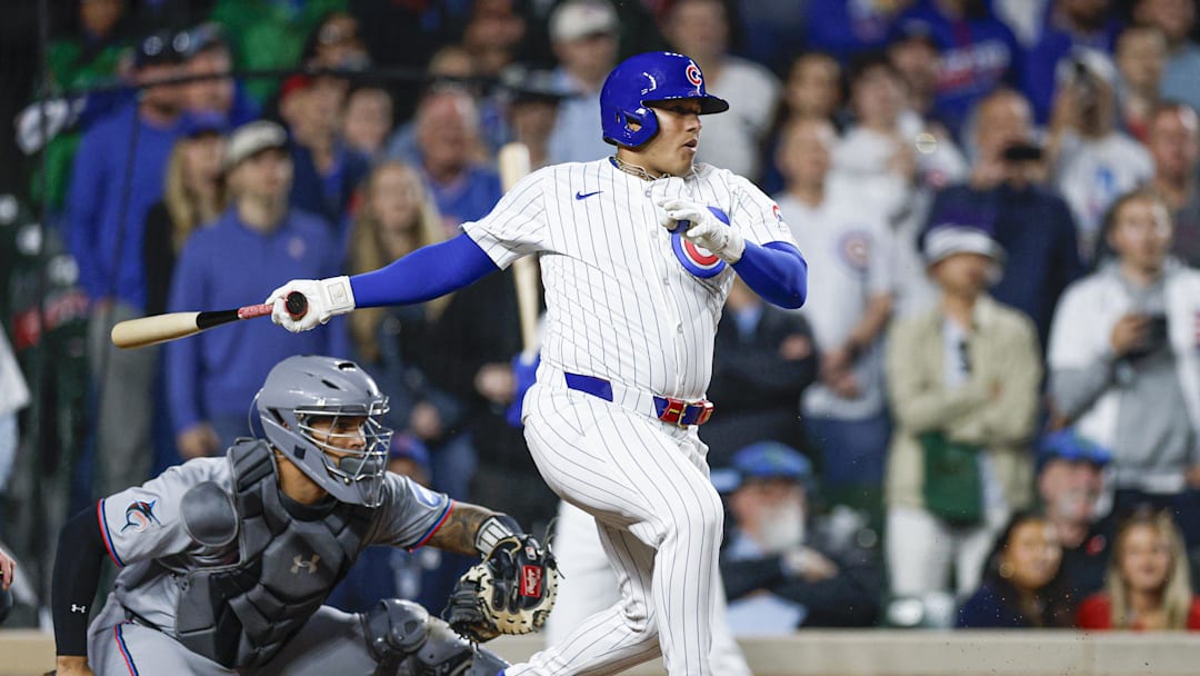 May 13, 2025; Chicago, Illinois, USA; Chicago Cubs designated hitter Moises Ballesteros (25) grounds into a force out against the Miami Marlins during the ninth inning at Wrigley Field. 