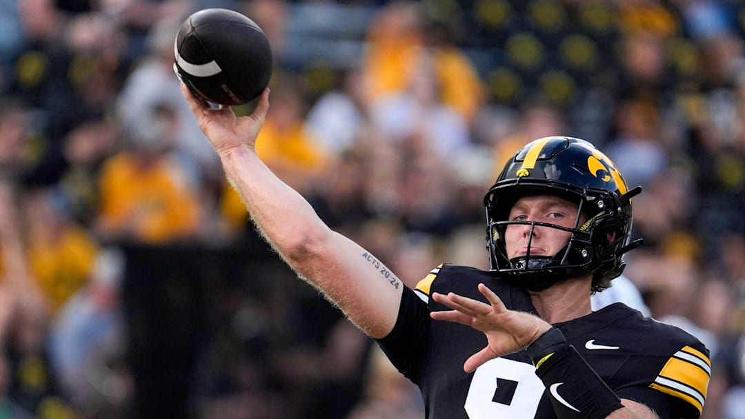 Iowa Hawkeyes quarterback Hank Brown (9) warms up before playing the Albany Great Danes Aug. 30, 2025 at Kinnick Stadium in Iowa City, Iowa.