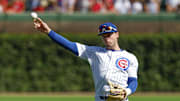 Sep 27, 2025; Chicago, Illinois, USA; Chicago Cubs second baseman Nico Hoerner (2) warms up before a baseball game against the St. Louis Cardinals at Wrigley Field. Mandatory Credit: Kamil Krzaczynski-Imagn Images
