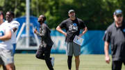 Detroit Lions head coach Dan Campbell watches practice during OTAs at Detroit Lions headquarters and practice facility in Allen Park on Tuesday, June 11, 2024.