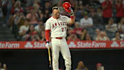 Sep 23, 2025; Anaheim, California, USA;  Los Angeles Angels right fielder Mike Trout (27) tips his cap to the crowd as they applaud the announcment of his 400th career home run during the first inning against the Kansas City Royals at Angel Stadium. Mandatory Credit: Jayne Kamin-Oncea-Imagn Images