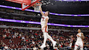 Nov 21, 2025; Chicago, Illinois, USA; Miami Heat guard Pelle Larsson (9) scores against the Chicago Bulls during the second half at United Center. Mandatory Credit: Kamil Krzaczynski-Imagn Images