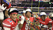 The UNLV Rebels celebrate after defeating the California Golden Bears in the LA Bowl at SoFi Stadium. 