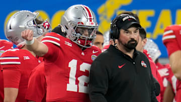 Dec 29, 2023; Arlington, Texas, USA; Ohio State Buckeyes quarterback Lincoln Kienholz (12) talks to