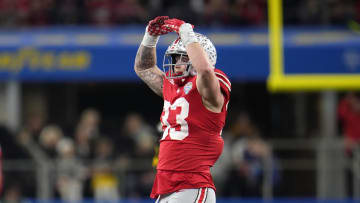 Dec 29, 2023; Arlington, TX, USA;  Ohio State Buckeyes defensive end Jack Sawyer (33) celebrates his sack of Missouri Tigers quarterback Brady Cook (12) in the third quarter during the Goodyear Cotton Bowl Classic at AT&T Stadium. Mandatory Credit: Kyle Robertson-USA TODAY Sports
