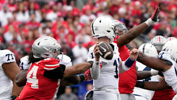 Oct 21, 2023; Columbus, Ohio, USA; Ohio State Buckeyes defensive end JT Tuimoloau (44) knocks the arm of Penn State Nittany Lions quarterback Drew Allar (15) as he tries to throw the ball on fourth down during the fourth quarter of their game at Ohio Stadium.