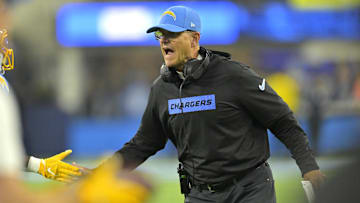 Dec 19, 2024; Inglewood, California, USA;  Los Angeles Chargers head coach Jim Harbaugh congratulates players after a score in the second half against the Denver Broncos at SoFi Stadium. Mandatory Credit: Jayne Kamin-Oncea-Imagn Images